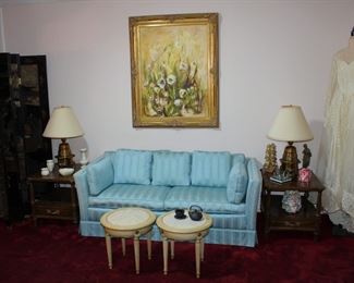 Fabulous moire striped blue sofa, with round marble top tables and Henredon tiered end tables with fabulous 1960's  brass lamps.