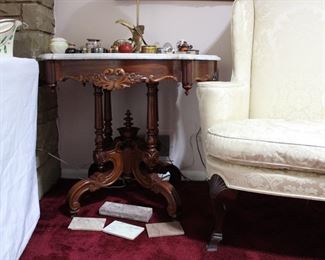 Ornate base of the Victorian marble top table