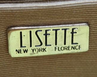 Label inside one of the Lisette purses