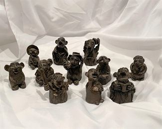 Collection of miniature solid bronze troll figures signed KYM