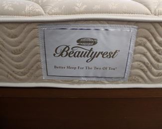 Full size mid century bed frame with clean Beautyrest mattress and spring