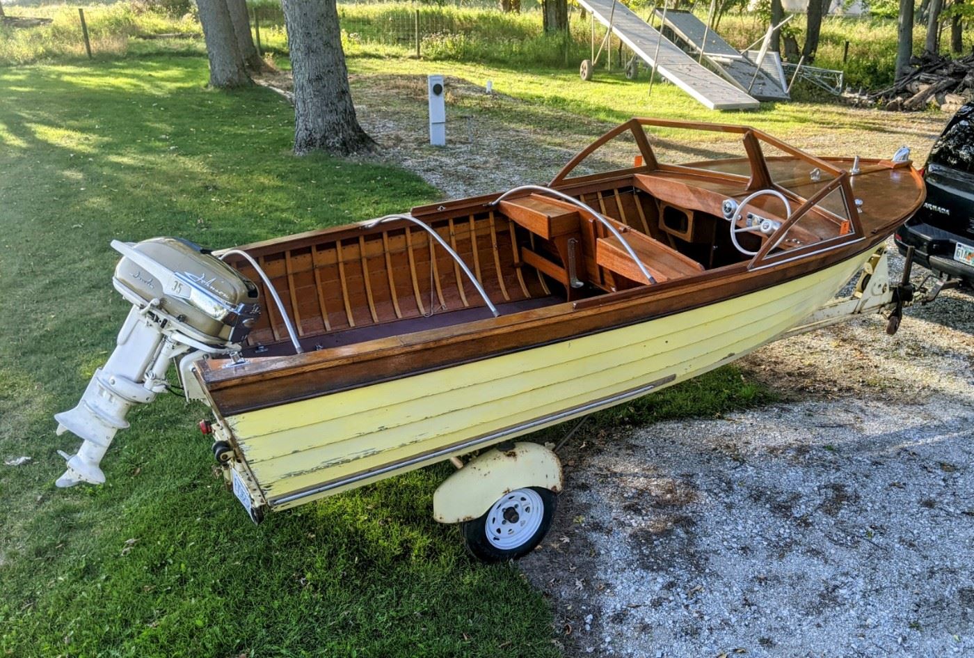 1957 Thompson 16 foot vintage wood boat with Johnson Javelin 35hp motor.  Extremely original boat with other vintage accessories.  Still has some refurbishing to be completed to make it water ready, otherwise a beautiful piece of  history. Asking $4200. Includes original trailer with new tires and rims.  Original tires and rims are included. 