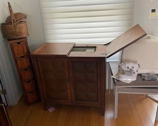 Singer, sewing machine and cabinet