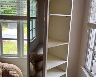 Revolving mirrored cabinet