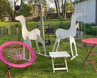 Wood deer
Spider chair 
Red patio table
Small white slatted patio table
