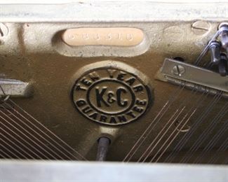 Another view of the Kohler & Campbell upright piano with piano bench