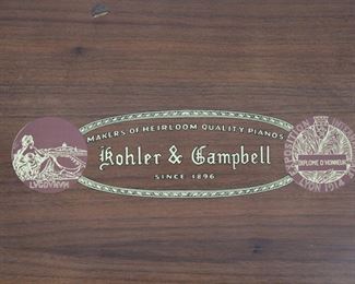 Another view of the Kohler & Campbell upright piano with piano bench