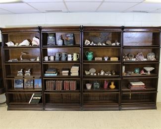 Made in Grand Rapids, Michigan! Four matching oak barrister bookcases, each one five stacks tall!