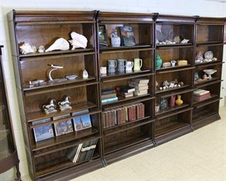 Another view of the five antique oak barrister bookcases in original finish