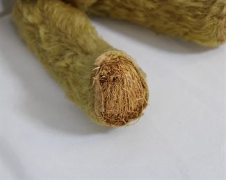 Foot of antique teddy bear