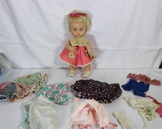 More doll clothes and a 1968 Jolly Toys doll