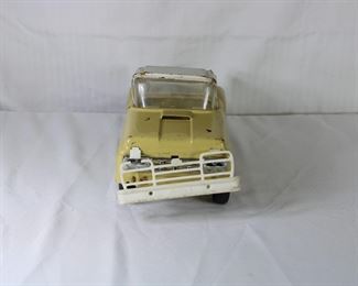Front view of the Buddy L vintage yellow pressed steel pick up truck