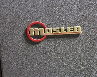 Maker's emblem on floor safe.