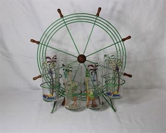 Mid century modern (MCM) ship's wheel wire beverage glasses caddy with tropical theme tumblers.