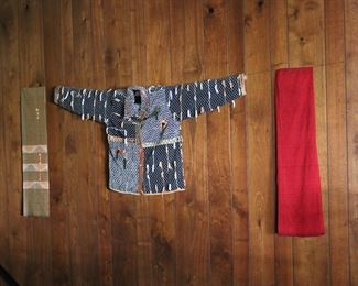 Asian textiles hung as wall decor