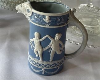 Shafer and Vater jasperware pitcher with figural ram's head spout