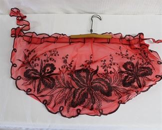 Sexy 1950's apron in red netting with black embroidery flowers