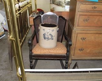 Antique 6 gallon crock and 1920's cane back rocking chair