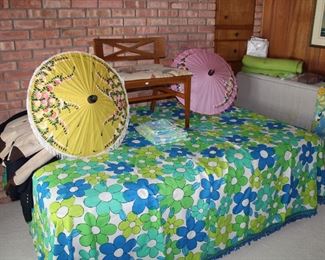 Can we say vintage decor? FAB Bedspread with large drape panels...and vintage Chinese style paper parasols 
