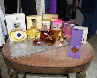 Vintage French perfumes including Guerlain Champs-Elysées, Vol De Nuit Eau de Cologne, and Shalimar in French Baccarat Bottle; Gianni Versace, Nina Ricci, and Norell Perfume