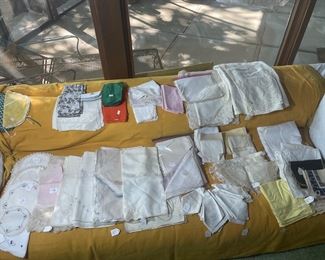 Vintage linens and napkin sets, many from Belgium