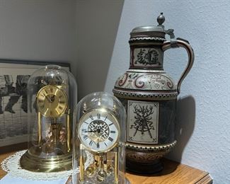 German Beer Stein and Swiss Pendulum Clocks