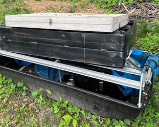 three portable fish houses