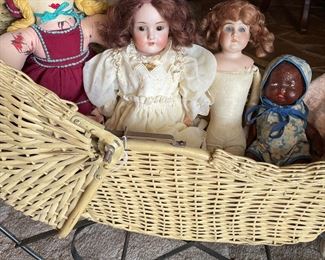 Lots of great antique dolls and cool buggy