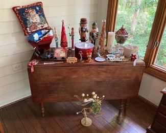 Walnut drop-Lear table, Christmas decorations 