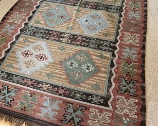 Approximately 5’ x 8’