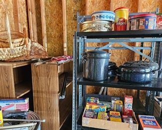Two bookshelves and lots of metal stackers