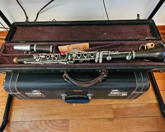 Old clarinet and vintage suitcase 