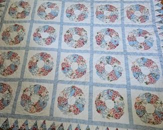 Handmade quilt in very good condition.  Old.