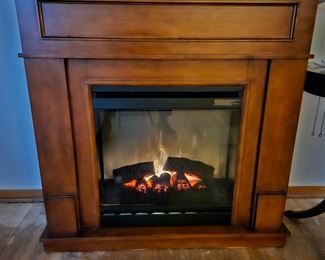 Lovely electric fire place with heat 40" x 40" x 13 1/2"
