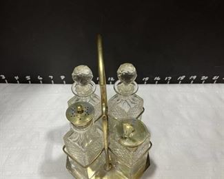 Silverplate cruet and salt and pepper holder