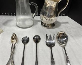 Silver-plate pitchers and serving utensils