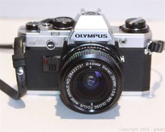 Olympus OM 10 35MM Film Camera with Carrying Case