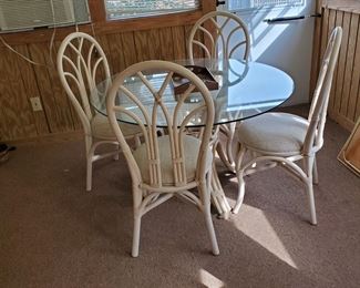 rattan sun porch glass top table and 4 chairs