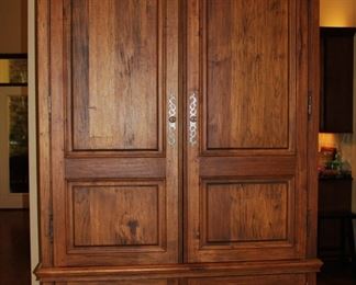 Large, entertainment, dresser armoire is in excellent condition.