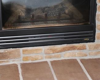 Matching ceramic vases with leaf motif.