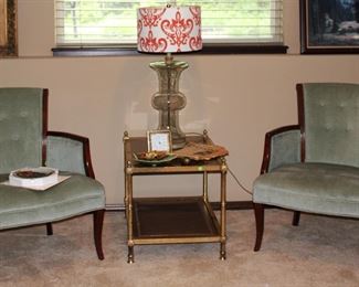 Mid century mint green upholstered armchairs.
