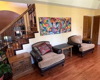 This house is fantastic! Front room features a pair of comfy overstuffed chairs, lovely original art and several wonderful A Brandt Ranch Oak pieces as well as some MCM style pieces..