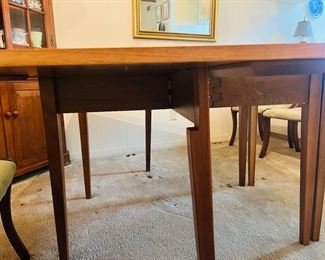 Walnut drop leaf table from High Point, NC, circa 1950.  Made by the Jones Brothers.    