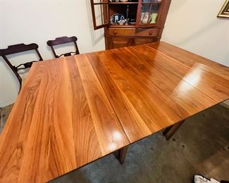 Walnut drop leaf table from High Point, NC, circa 1950.  Made by the Jones Brothers.    