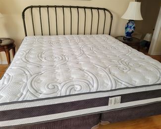 King iron headboard and bed