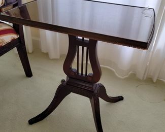Glass top harp tables