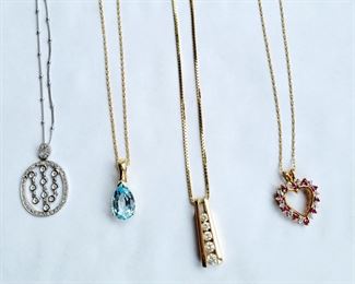 Diamond necklaces, ruby and blue topaz
