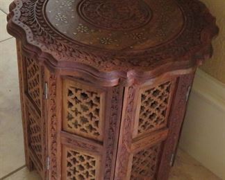 Carved wood accent table