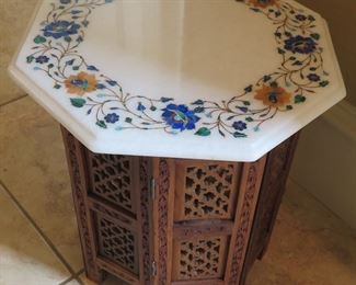 Folding table with marble inlay top
