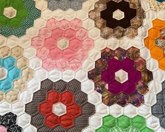 Double knit flower garden quilt 
 Hand quilted 